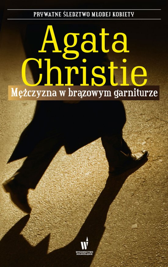 M�czyzna w br�zowym garniturze