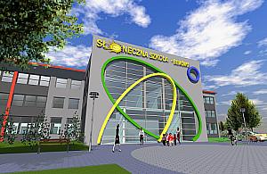 Słońce wschodzi nad szkołą na Zachodzącego Słońca