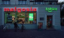 Historyczny neon "Małgosia" znów zdobi plac Wilsona