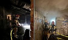 Groźny pożar dachu w pięciopiętrowej kamienicy na Pradze Północ